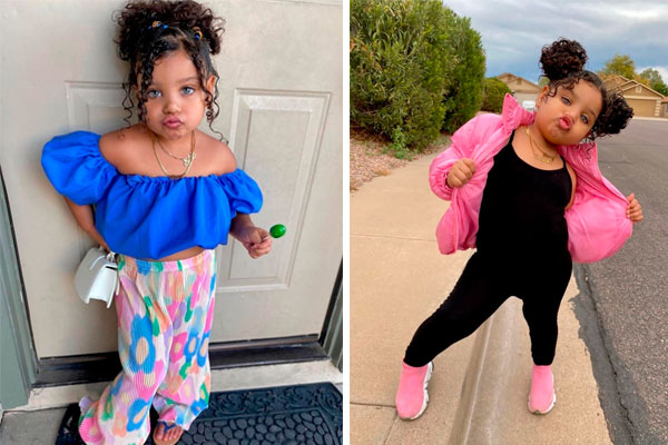 Na imagem, há duas fotos de uma mesma menina de 4 anos. À esqueda, ela usa top azul e calça colorida, com colar e cabelos presos. À direita, ela usa macacão preto, tênis e jaqueta pink. Ela tem a pele morena, os olhos azuis, cabelo castanho e cacheado.